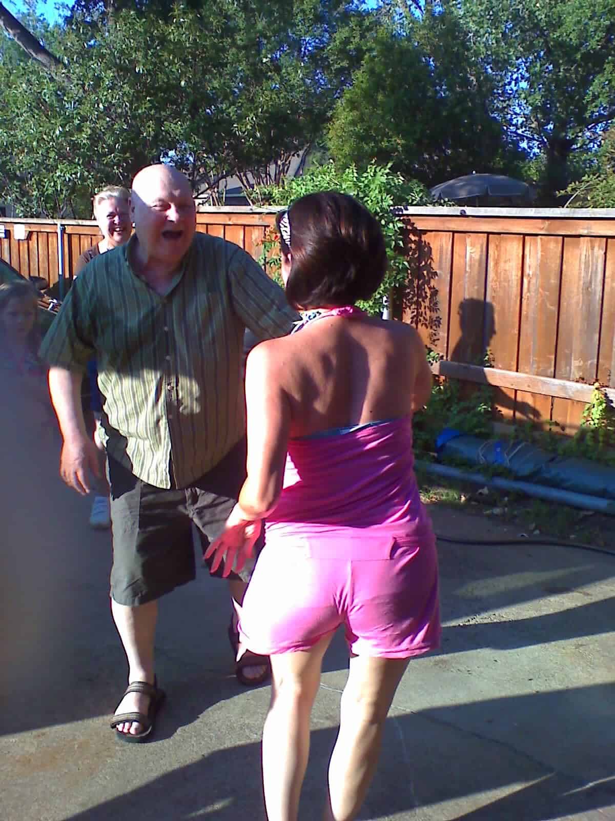 Dad dancing with daughter-in-law
