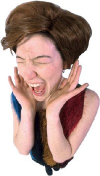 Woman with her hands over her ears.